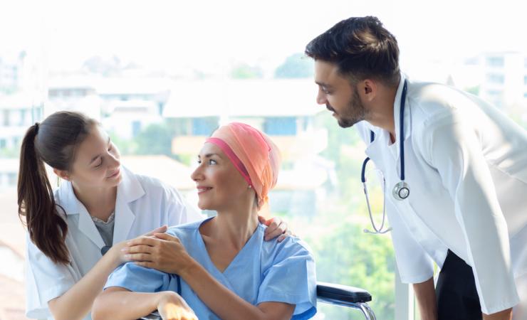Woman with cancer speaking with doctors_shutterstock_1530668297_Credit_Nutnutchar NAV